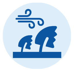 An icon showing strong wind gusts affecting trees